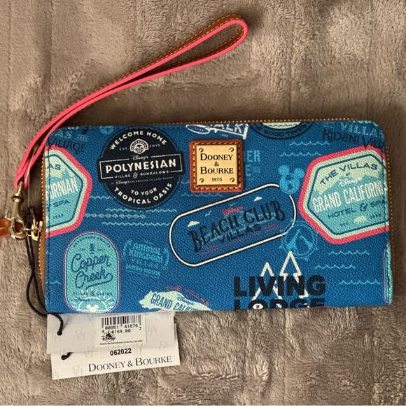 Dooney & Bourke Handbags - NWT Dooney & Bourke Blue and Pink Disney Wristlet